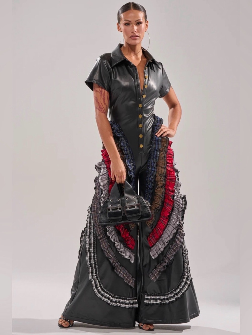 Black Faux Leather Jumpsuit with Ruffled Plaid Skirt Panels